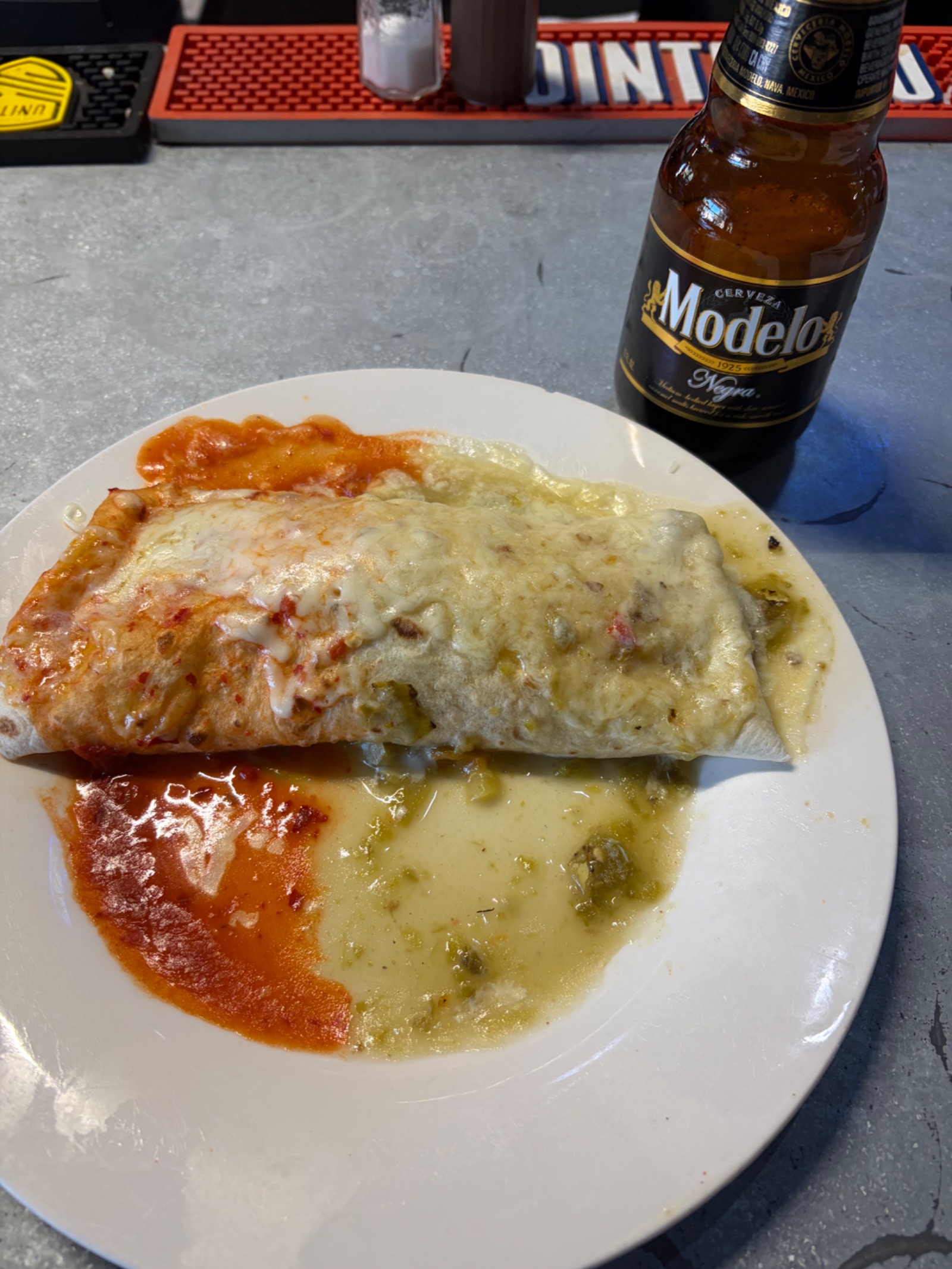 You can’t beat a $2.99 Breakfast burrito bathing in Christmas chile with a Modelo beer.